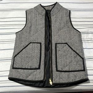 Black and  White vest Size small.